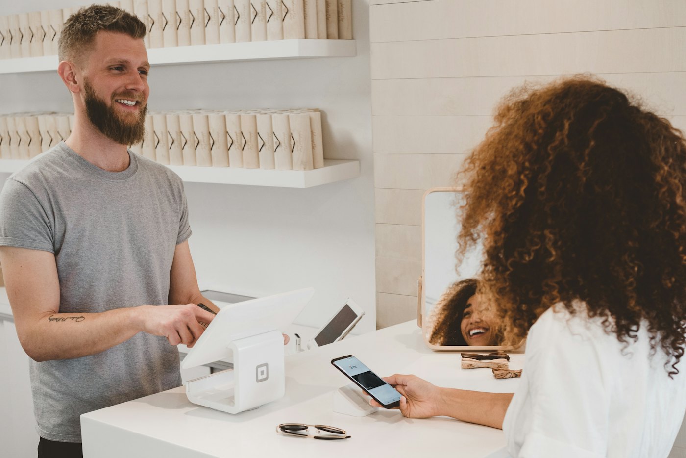 Support agent replying to customers from a laptop